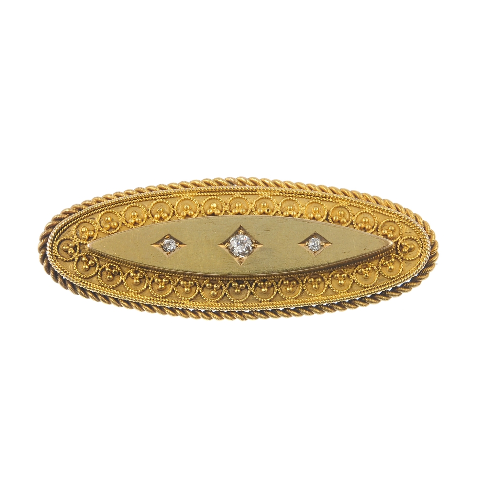 A late Victorian gold diamond brooch with memorial panel. Of marquise-shape outline with three
