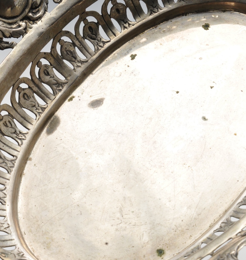 A German pierced bread basket of quatrefoil outline, the wide border decorated with semi-naked - Image 4 of 6