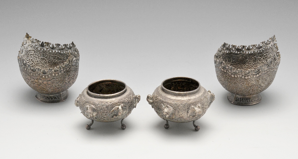 Two pairs of Asian open salts, comprising a pair of squat form having border of alternating birds