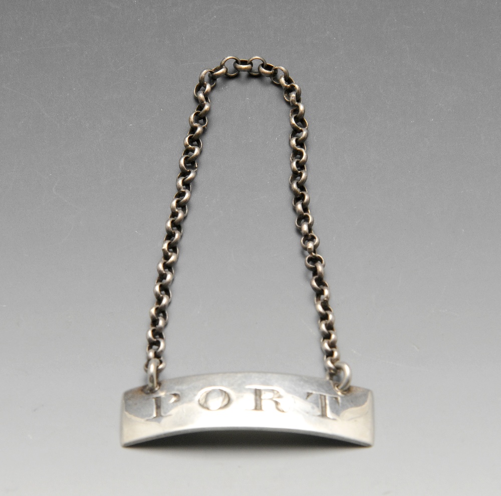 A George III silver wine label of plain oblong form engraved 'PORT', and suspended on belcher chain.