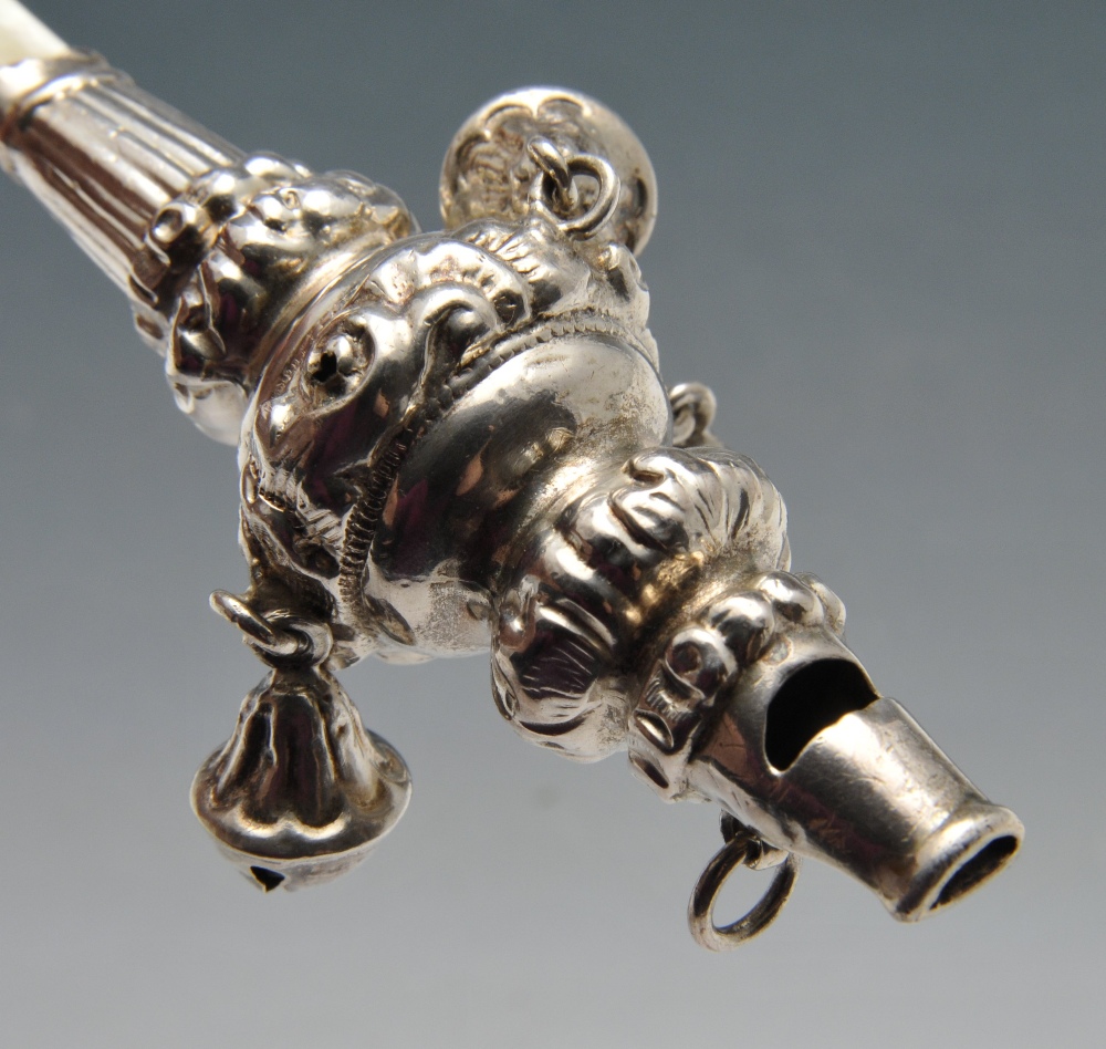 An Edwardian silver mounted rattle, of baluster form with whistle, bell suspensions and mother-of- - Image 3 of 3