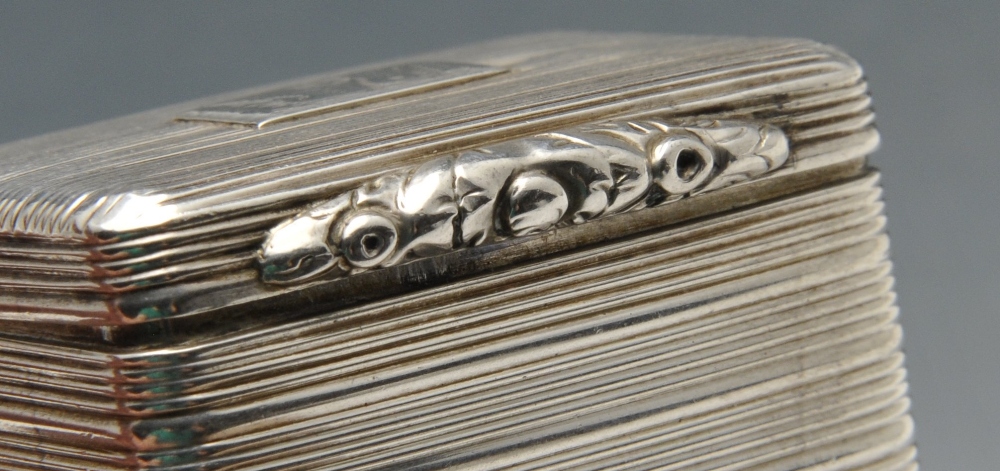 A George IV silver nutmeg grater, the oblong reeded form with dual hinges, crested cartouche and - Image 5 of 5