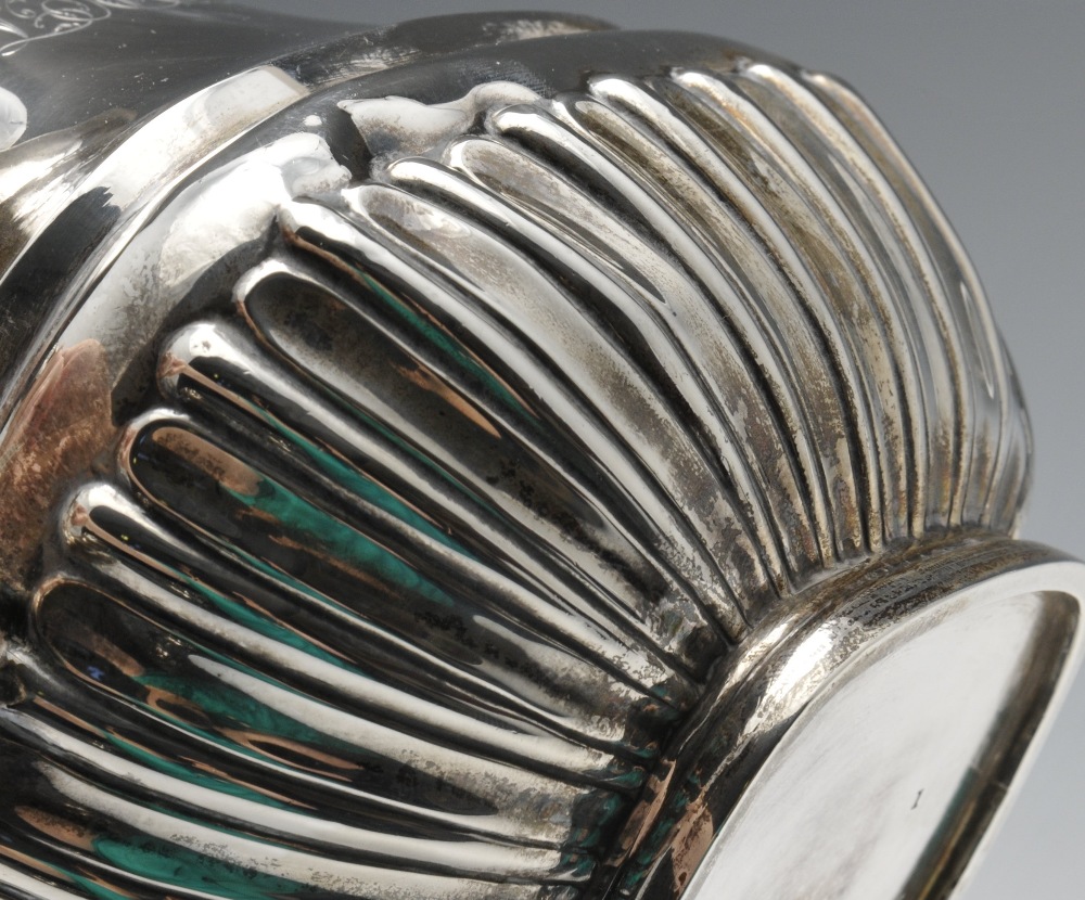 An Edwardian five piece silver tea service, of oblong form, the lower bodies fluted, rising to the - Image 5 of 9