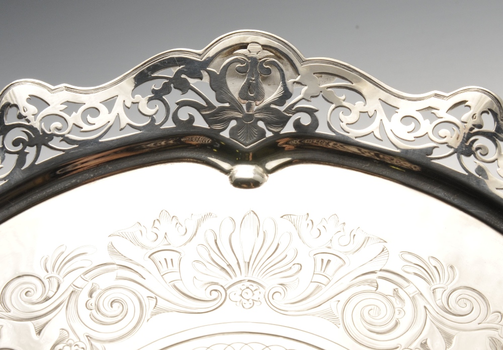 A mid-Victorian silver salver of shaped circular form with foliate scroll pierced rim enclosing a - Image 4 of 15