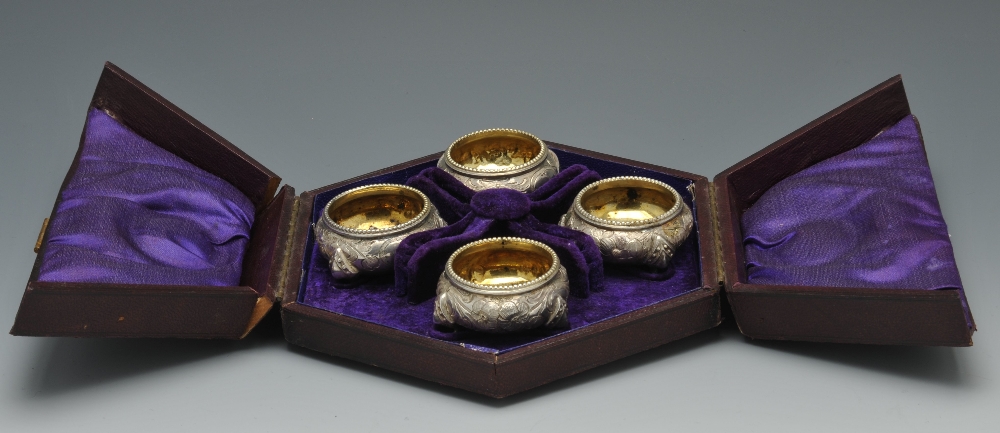 A set of three silver napkin rings of pierced circular form and decorated with stylised floral - Image 7 of 11