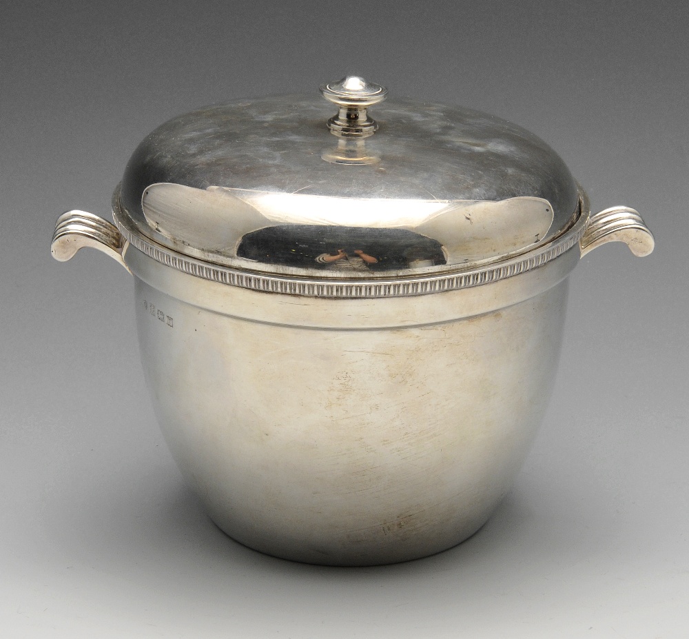 A modern silver mounted ice bucket and cover, the plain slightly tapering form with scroll