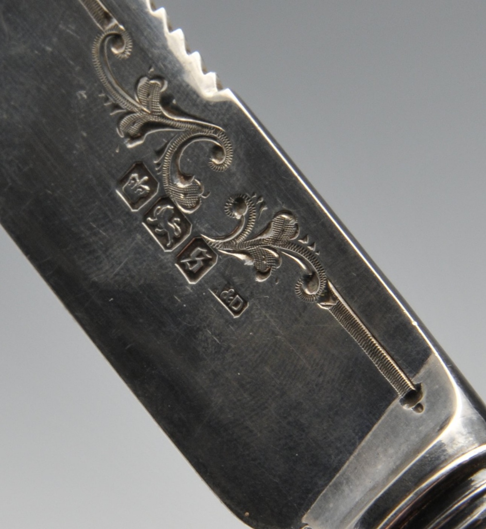A George V silver bread knife, the blade having scrolling border to the serrated edge leading to the - Image 2 of 4