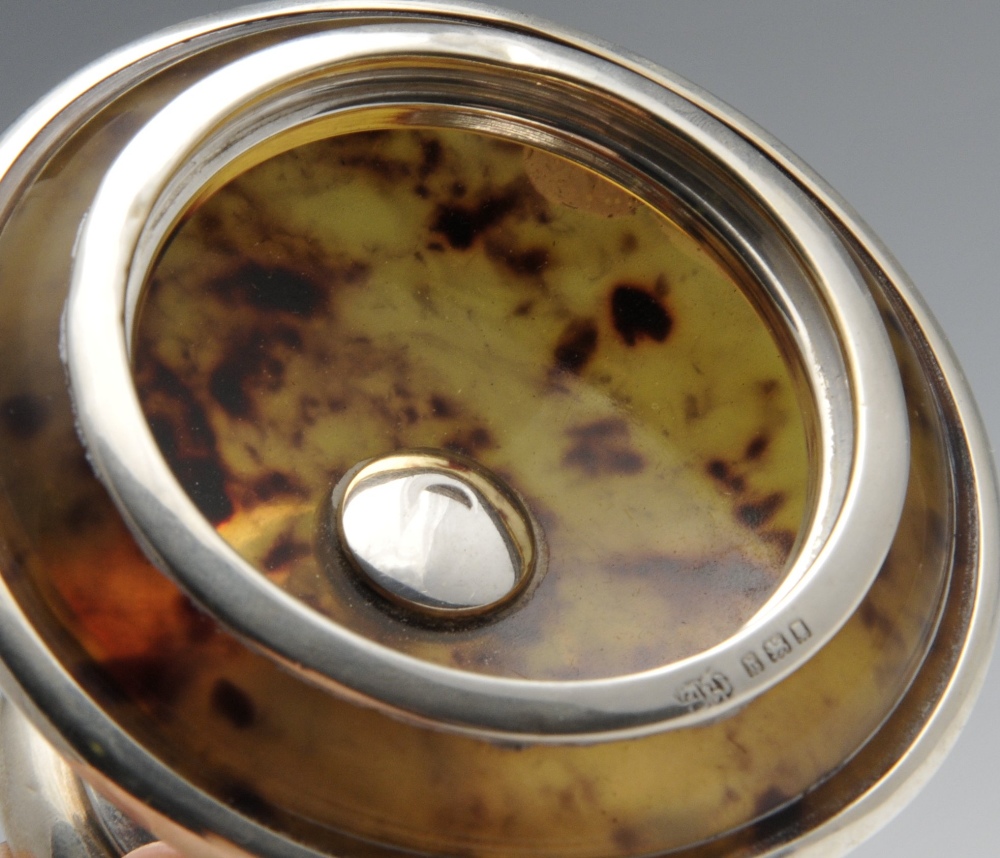 A 1920's silver mounted tortoiseshell box, the elliptical form standing on a pedestal foot. - Image 4 of 4