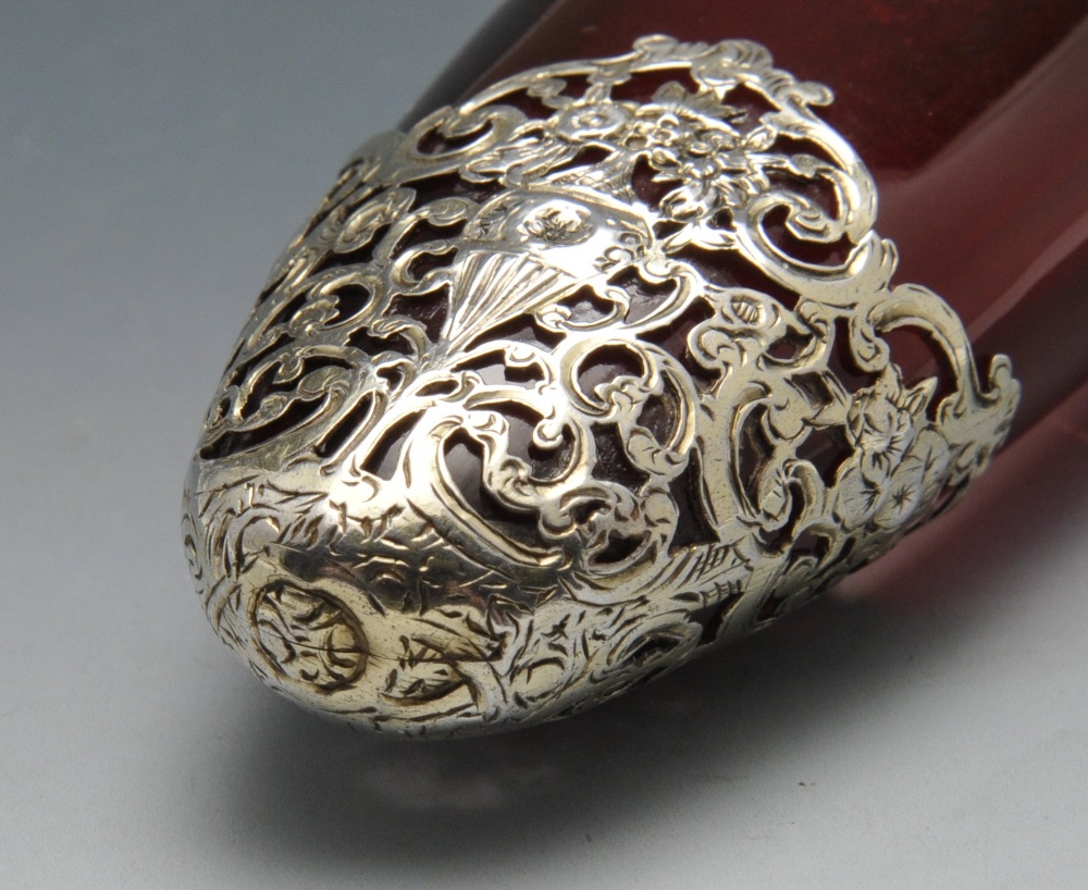 A French scent bottle, the cranberry glass body of tapered form and overlaid with scroll open-work - Image 4 of 6