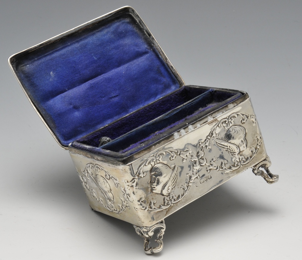 An Edwardian silver mounted jewellery box of oblong form, embossed with putti and opening to a - Image 2 of 6