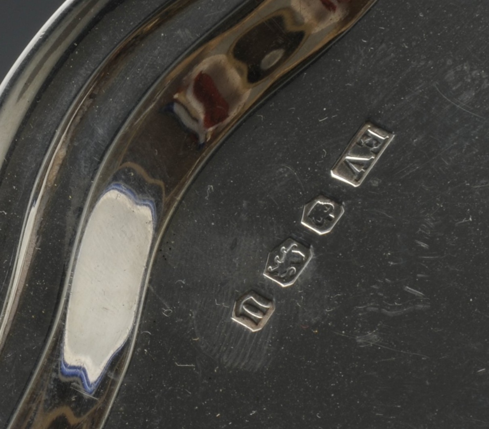 A modern silver salver the circular form with raised and shaped edge and standing on three scroll - Image 3 of 4