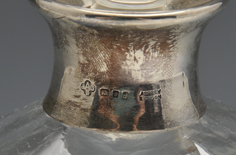 A pair of modern silver mounted clear glass glug-glug decanters, with silver collars and spherical - Image 2 of 2