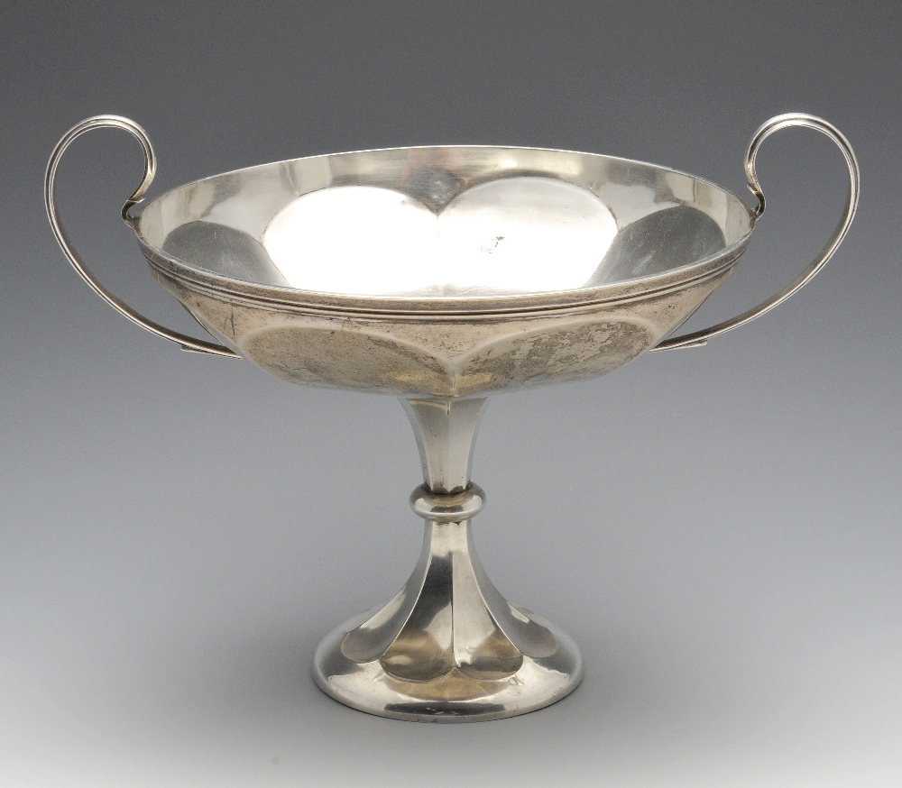 An early twentieth century silver tazza, the circular outline with octagonal lobed body, twin high