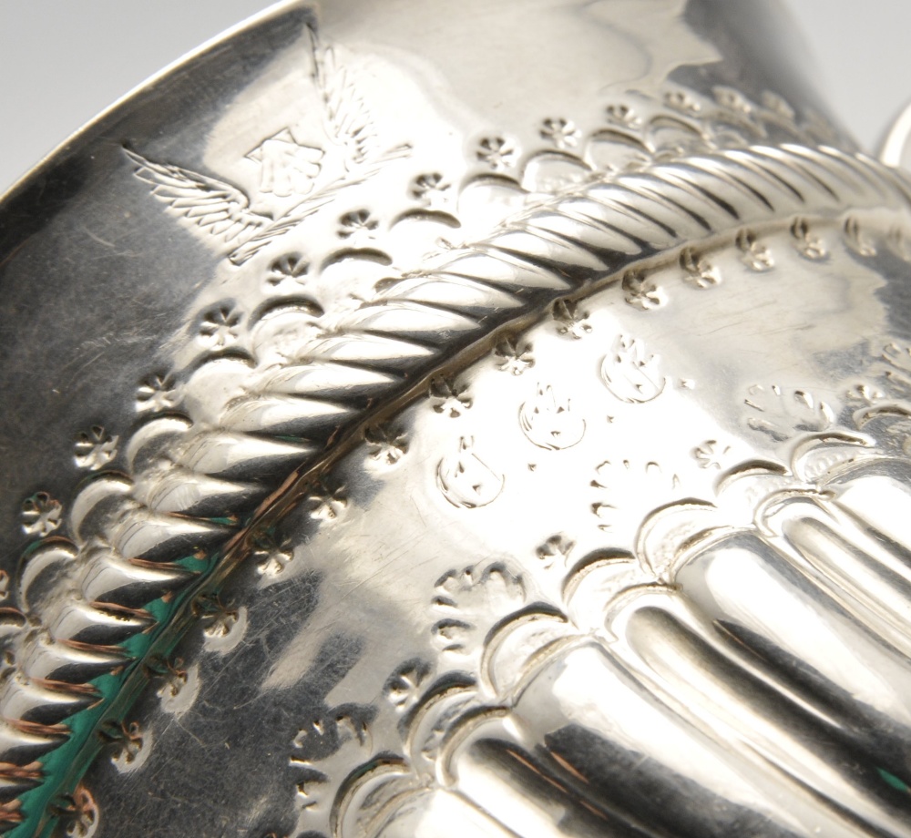 A Queen Anne small silver porringer, of typical form with oblique fluted lower body rising to an - Image 2 of 5