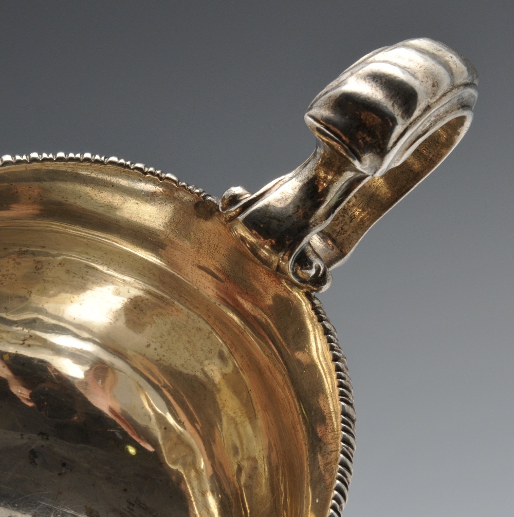 An early twentieth century large silver sauce boat, the traditional form standing on three splayed - Image 6 of 6