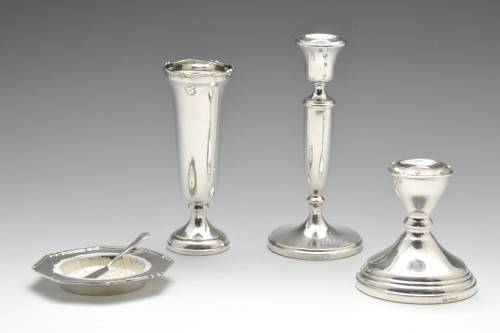 A small group of modern silver items to include a 1960's squat candlestick having interlocking