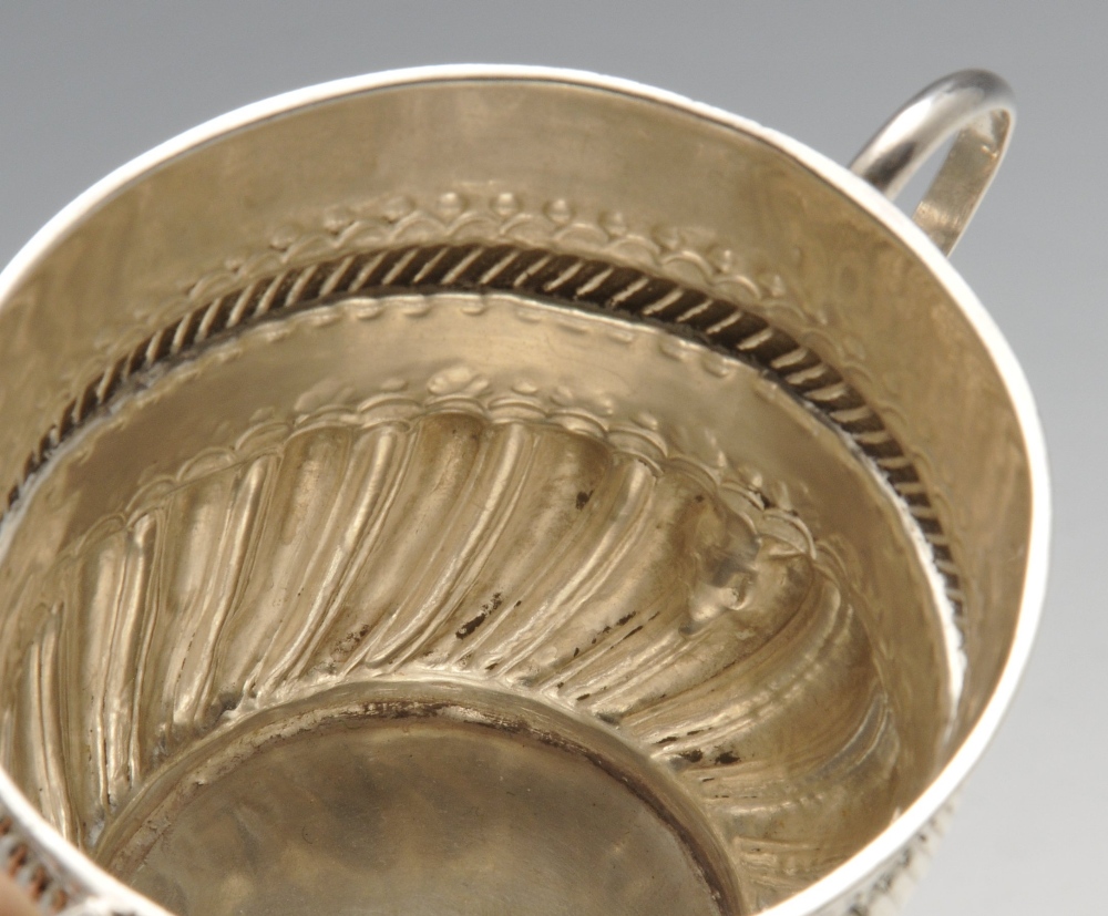 A Queen Anne small silver porringer, of typical form with oblique fluted lower body rising to an - Image 5 of 5