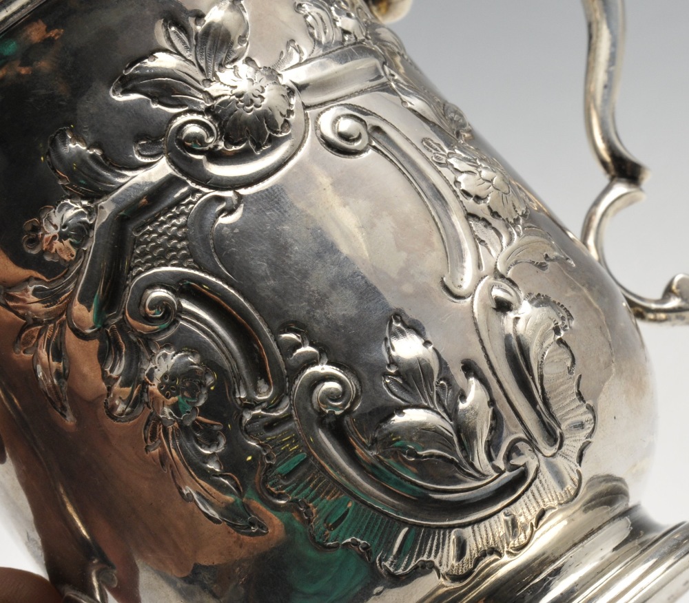 An early George III silver twin-handled cup, the baluster form with dual floral embossed surround to - Image 3 of 5