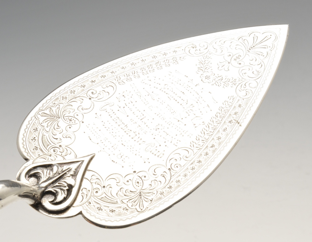 A late Victorian ivory handled silver trowel, having engraved and stippled foliate borders enclosing - Image 3 of 6