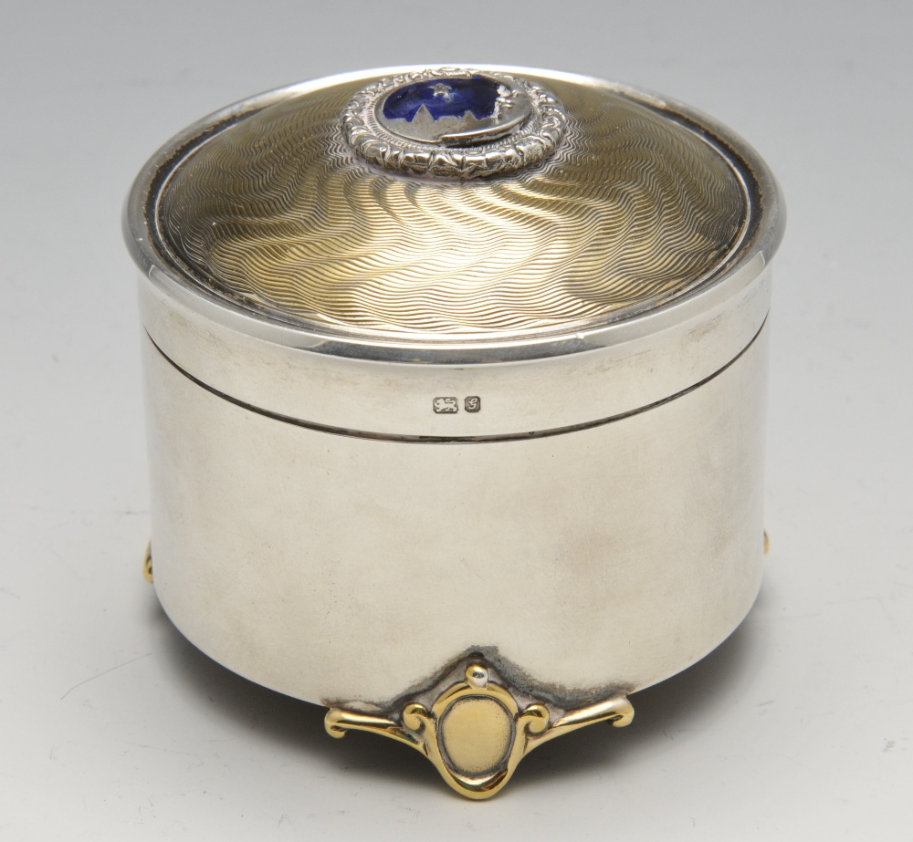 A modern silver musical jewellery or trinket box, the cylindrical with silver-gilt engine-turned - Image 2 of 9