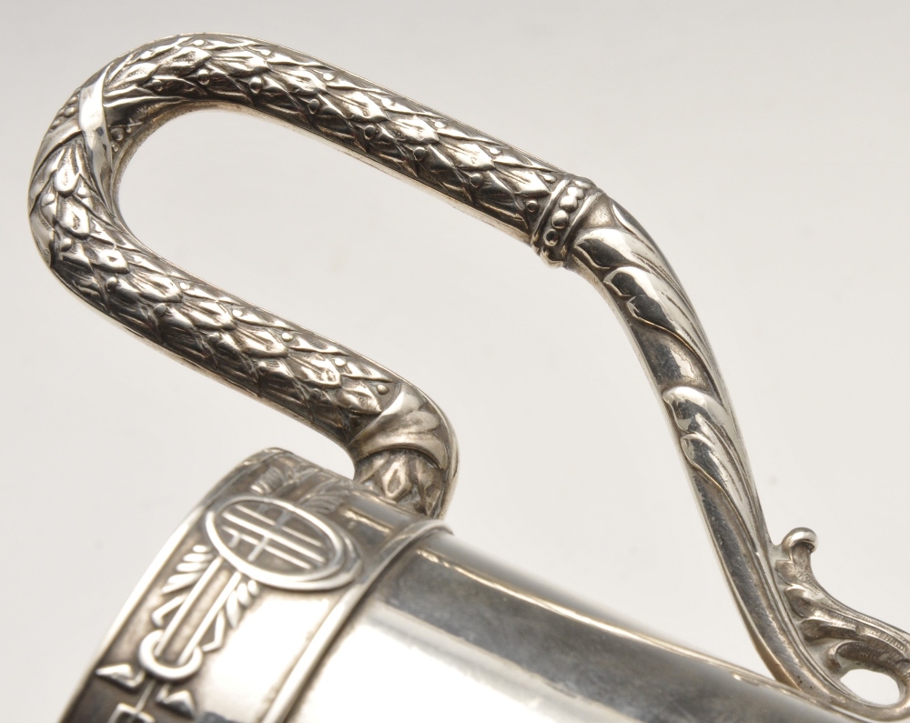 An early twentieth century Russian silver tea glass holder of cylindrical form with flared foot, - Image 4 of 4