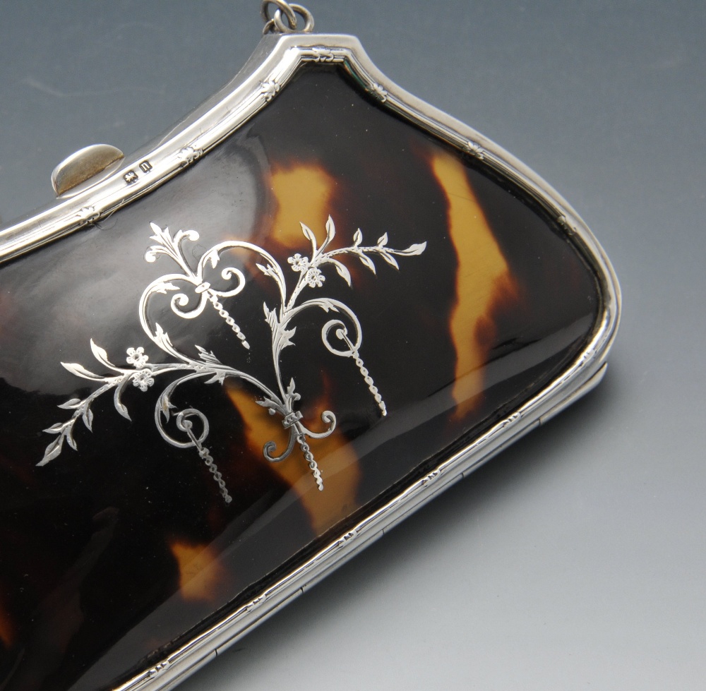 An early twentieth century silver and tortoiseshell purse, the shaped and tapered body further - Image 2 of 4