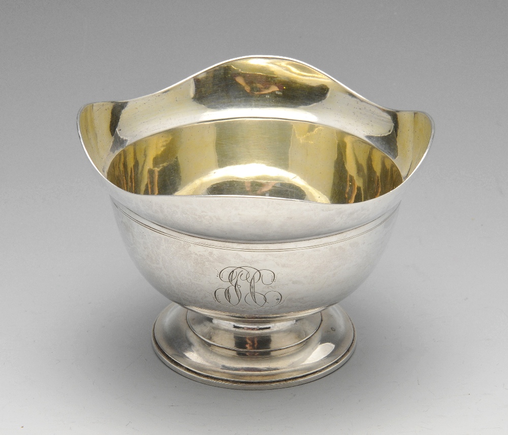 An early nineteenth century Russian silver bowl, the spherical hand raised body with initial