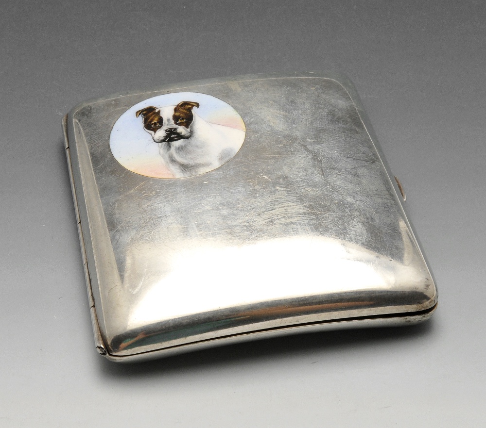 A German silver cigarette case, the plain oblong form inset with a circular enamelled cartouche