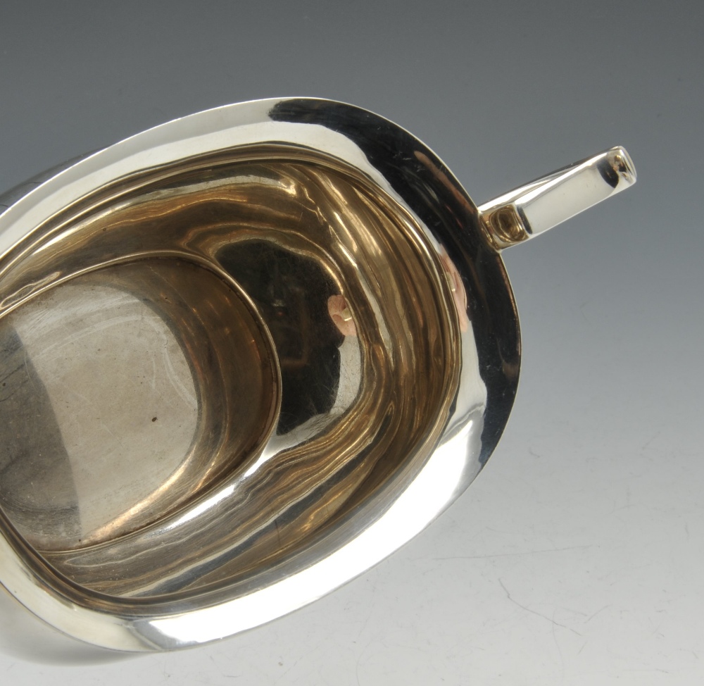 A 1930's silver three piece tea service comprising teapot, cream jug and twin-handled sugar bowl, - Image 6 of 8