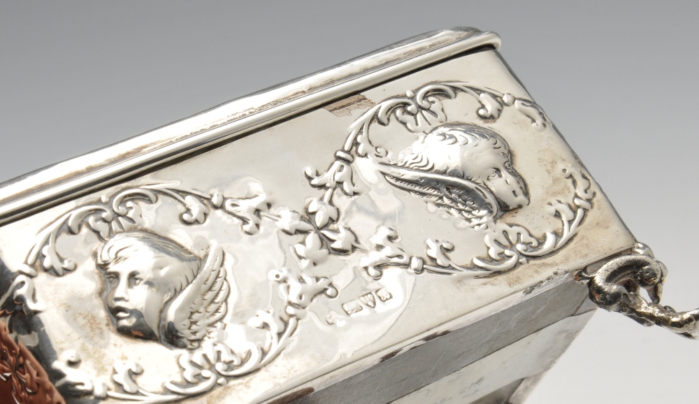 An Edwardian silver mounted jewellery box of oblong form, embossed with putti and opening to a - Image 4 of 6