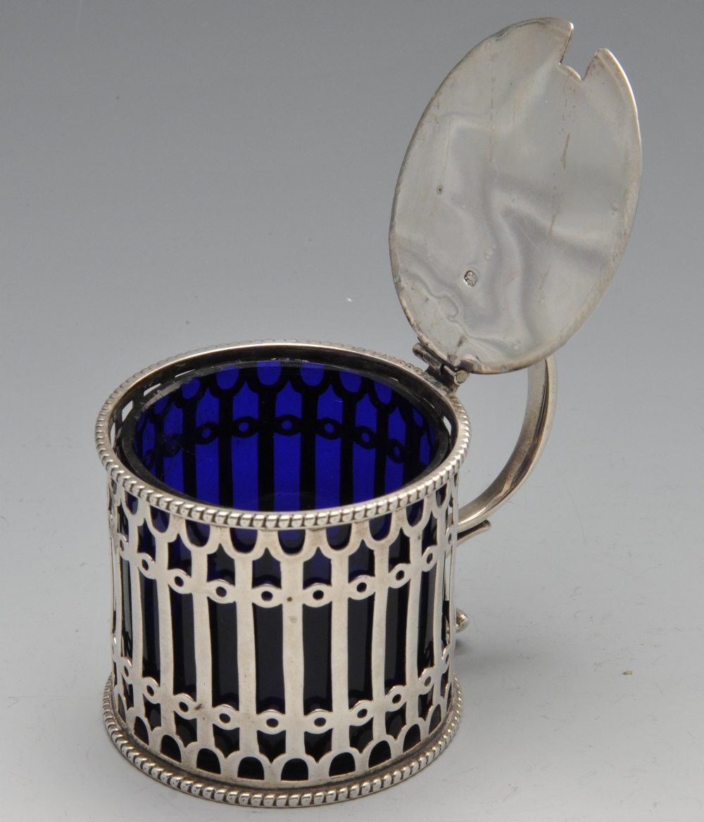 A Victorian silver drum mustard pot of pierced openwork form and blue glass liner. Hallmarked - Image 2 of 4