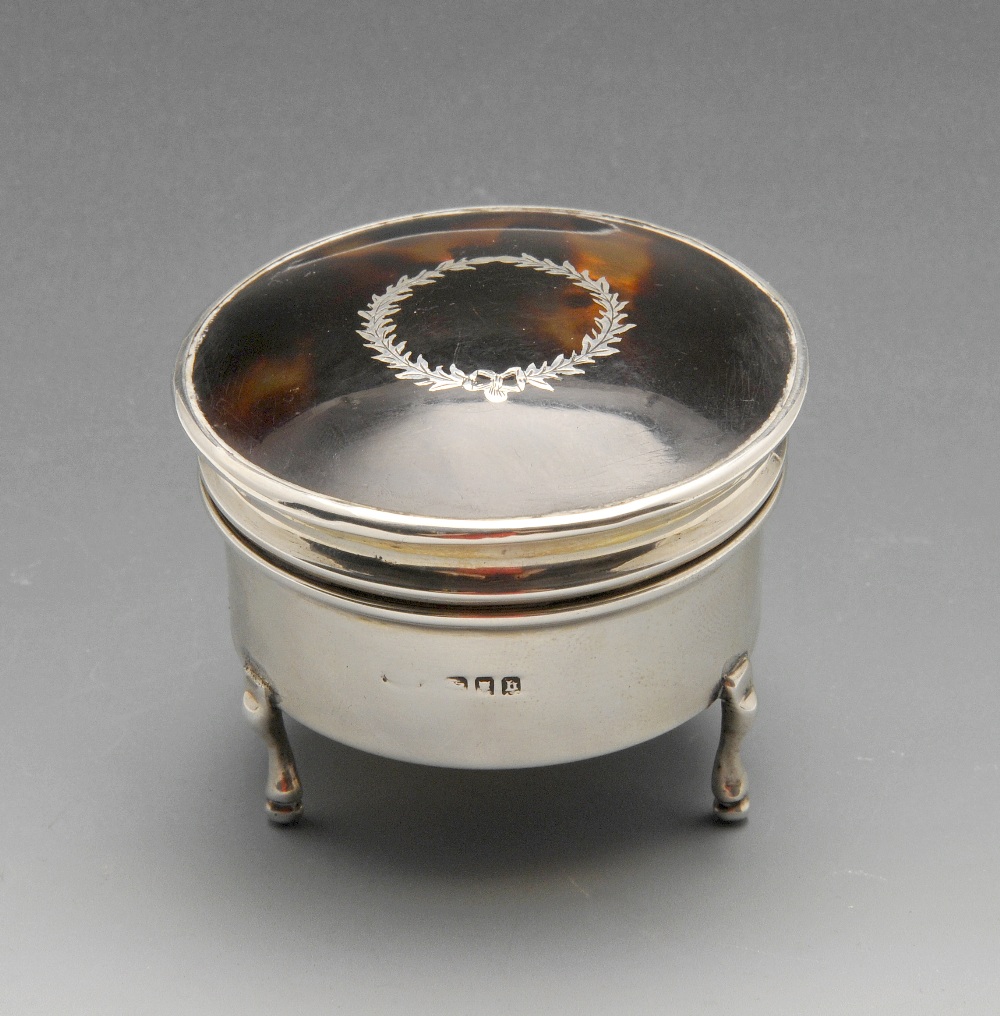 An early twentieth century silver tortoiseshell jewellery or trinket box, the circular body with