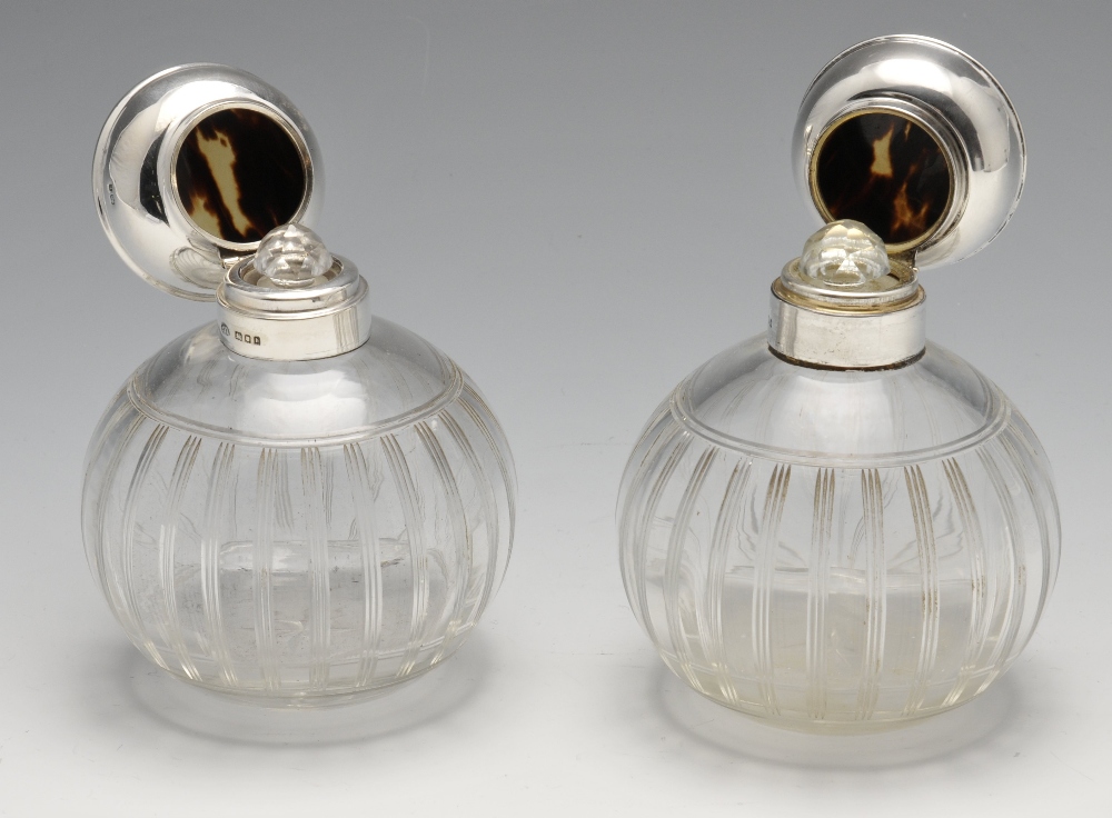 A pair of 1920's scent bottles, each with globular glass body rising to a plain silver collar and - Image 5 of 5