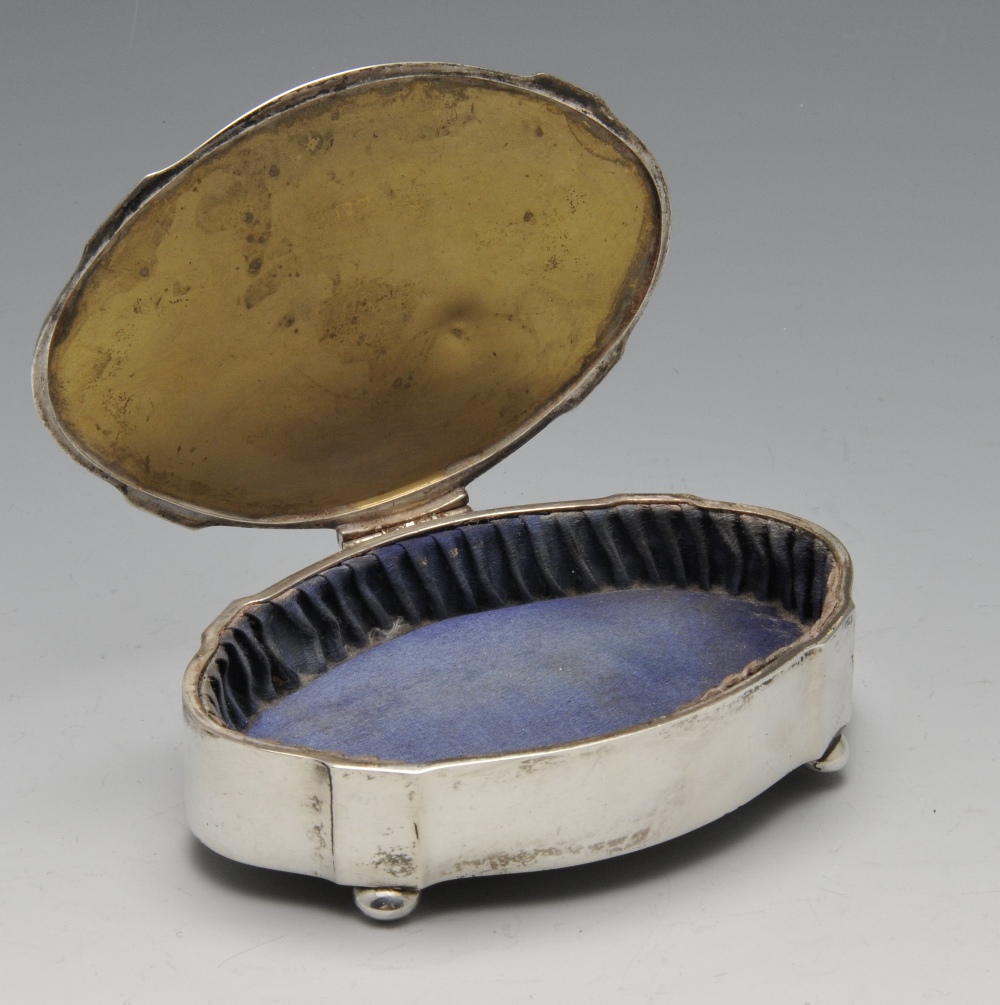 A 1920's silver mounted trinket box, of plain oval outline having lined interior and gilding to - Image 2 of 7