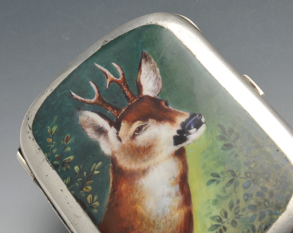 A continental cigarette case, the rounded oblong form with enamel decoration depicting a reindeer - Image 5 of 5