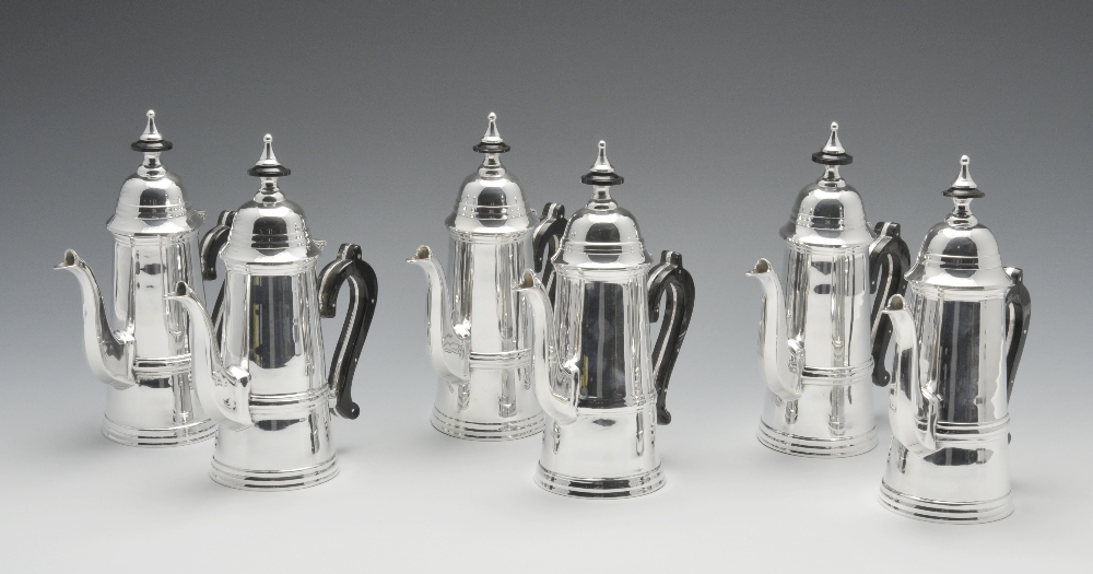 A set of six modern silver plated coffee pots, each straight sided and tapered body, with inlaid