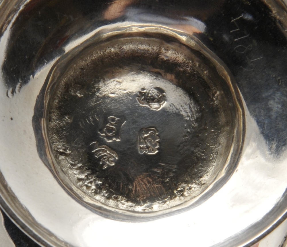 A George II small silver caster, the plain baluster form with girdle detail and raised on a footed - Image 2 of 3