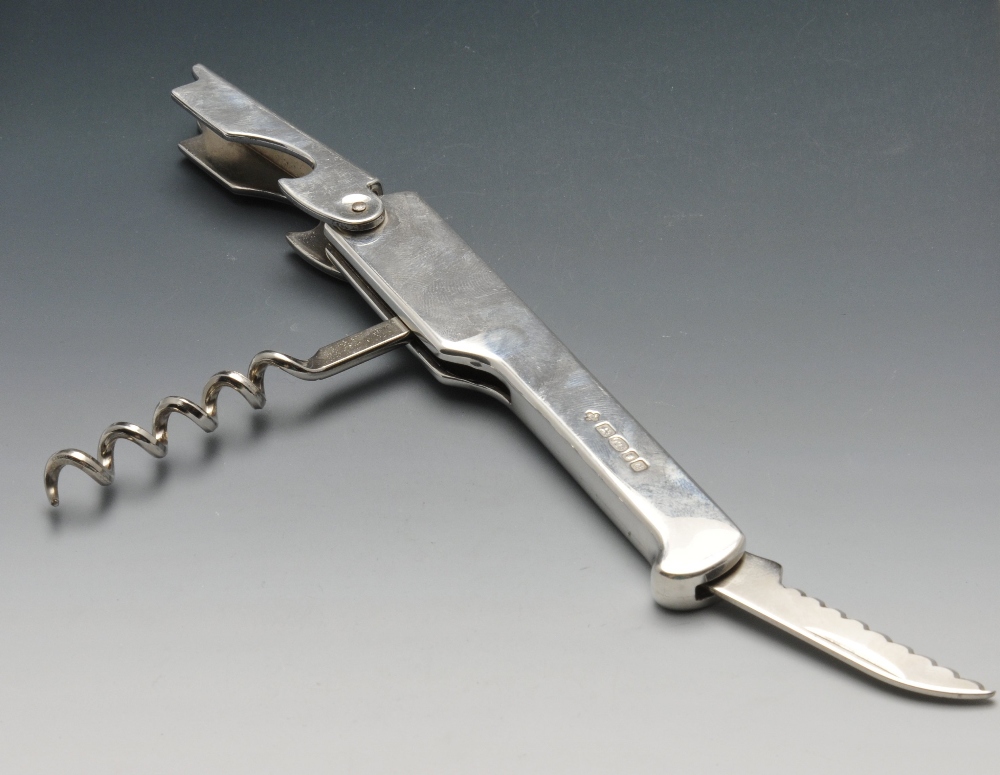 A modern silver mounted corkscrew and bottle opener. Hallmarked Marlow Brothers, London 2003. Length - Image 3 of 3