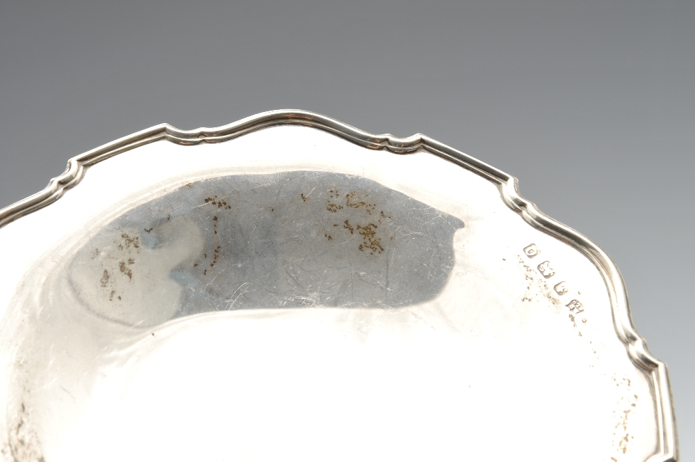 A 1930's silver twin-handled footed dish of plain circular form, hallmarked Adie Brothers Ltd., - Image 5 of 5