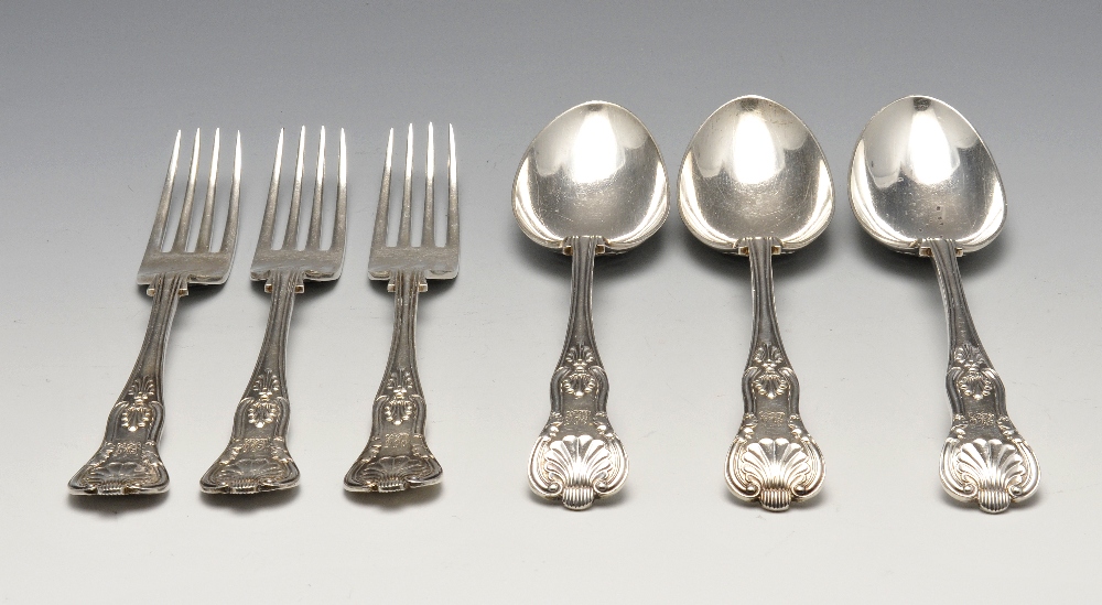 A late Victorian silver Kings pattern part canteen, comprising six dinner forks, three side forks,