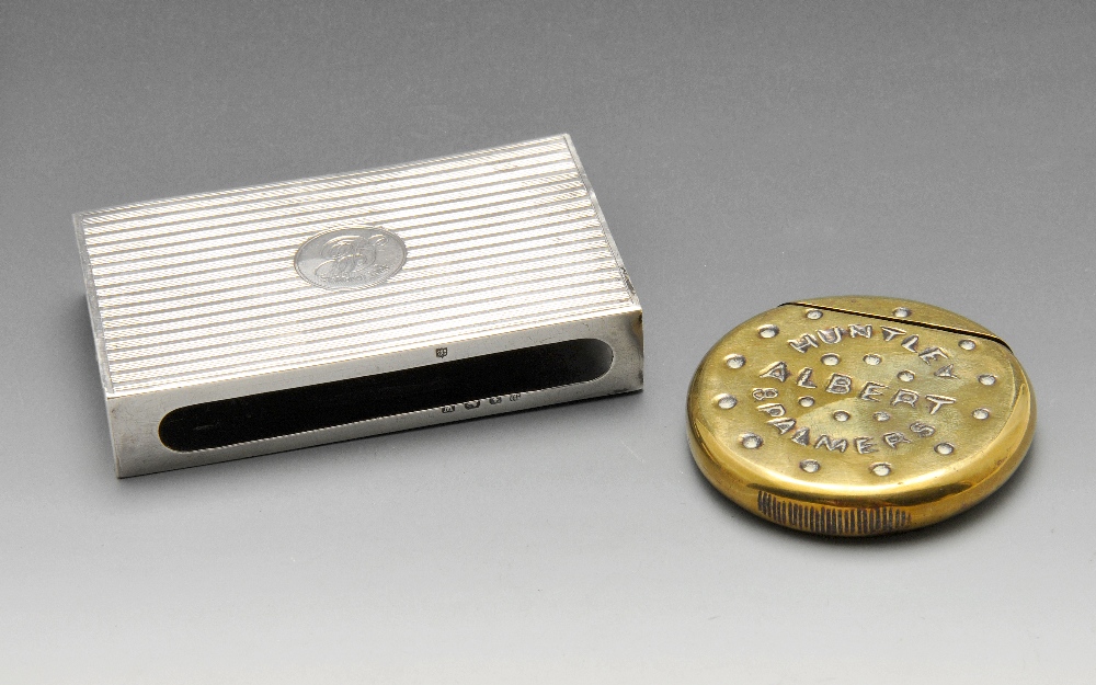 A George V silver match box sleeve, of rectangular form having reeded decoration and initialled