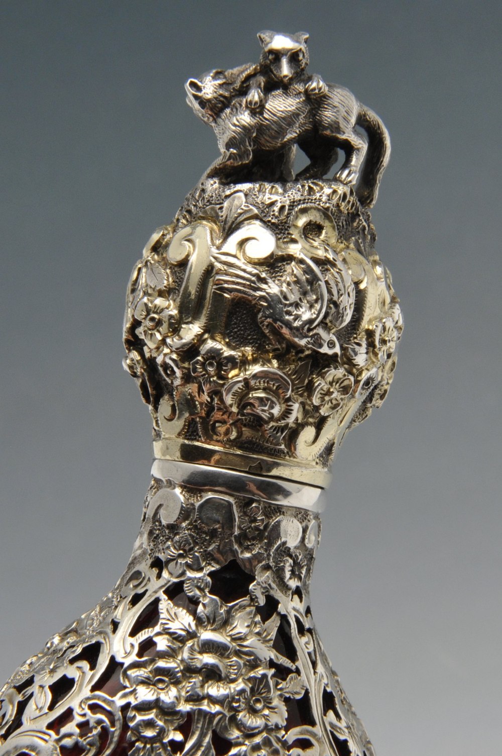 A French scent bottle, the cranberry glass body of tapered form and overlaid with scroll open-work - Image 2 of 6