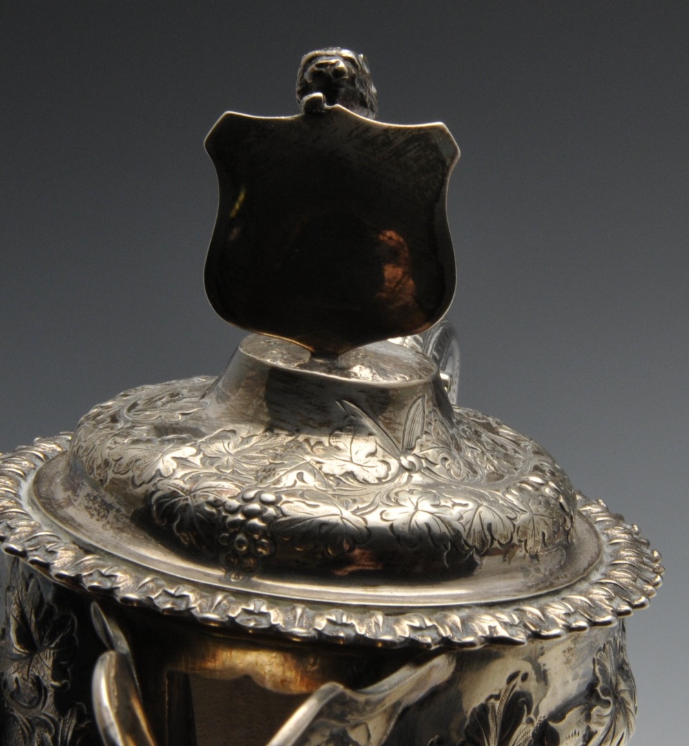 A late Victorian silver mounted claret jug, the Bacchanalian mount having lion and vacant shield - Image 6 of 8