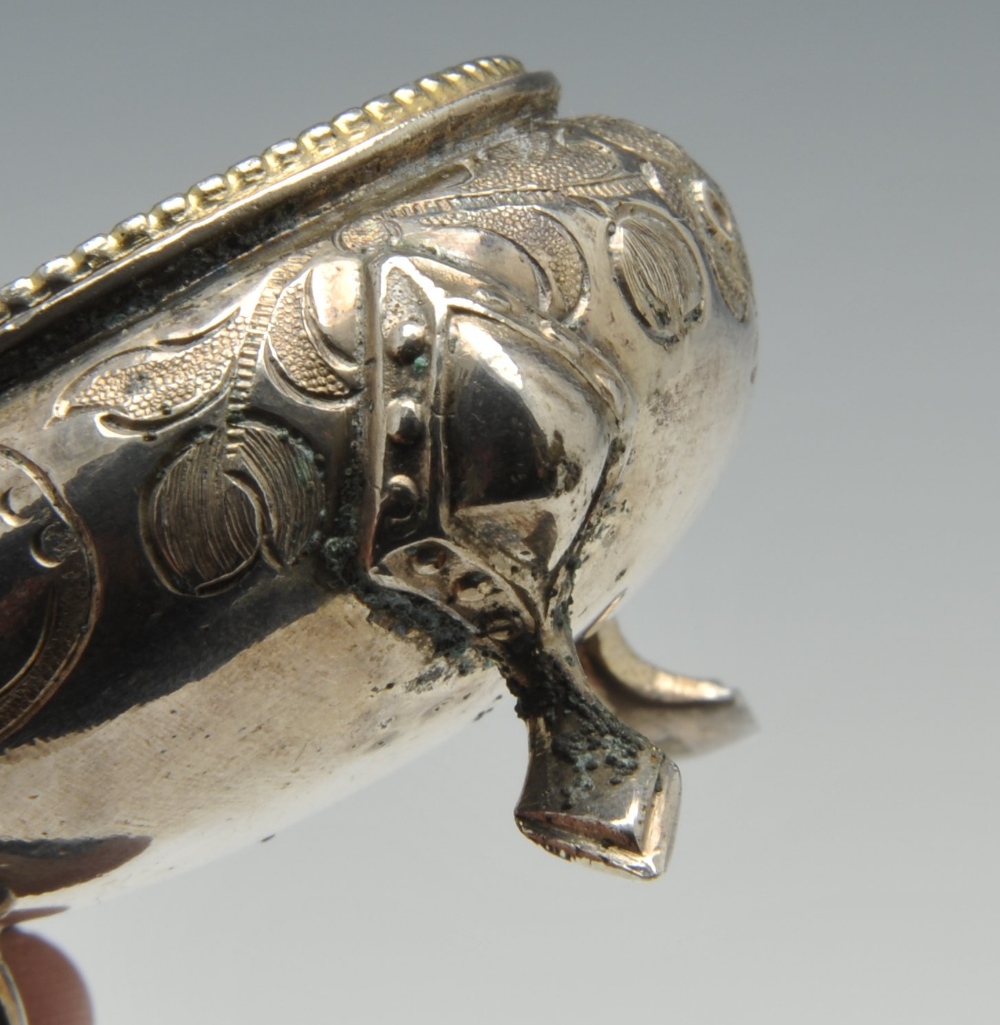 A set of three silver napkin rings of pierced circular form and decorated with stylised floral - Image 9 of 11