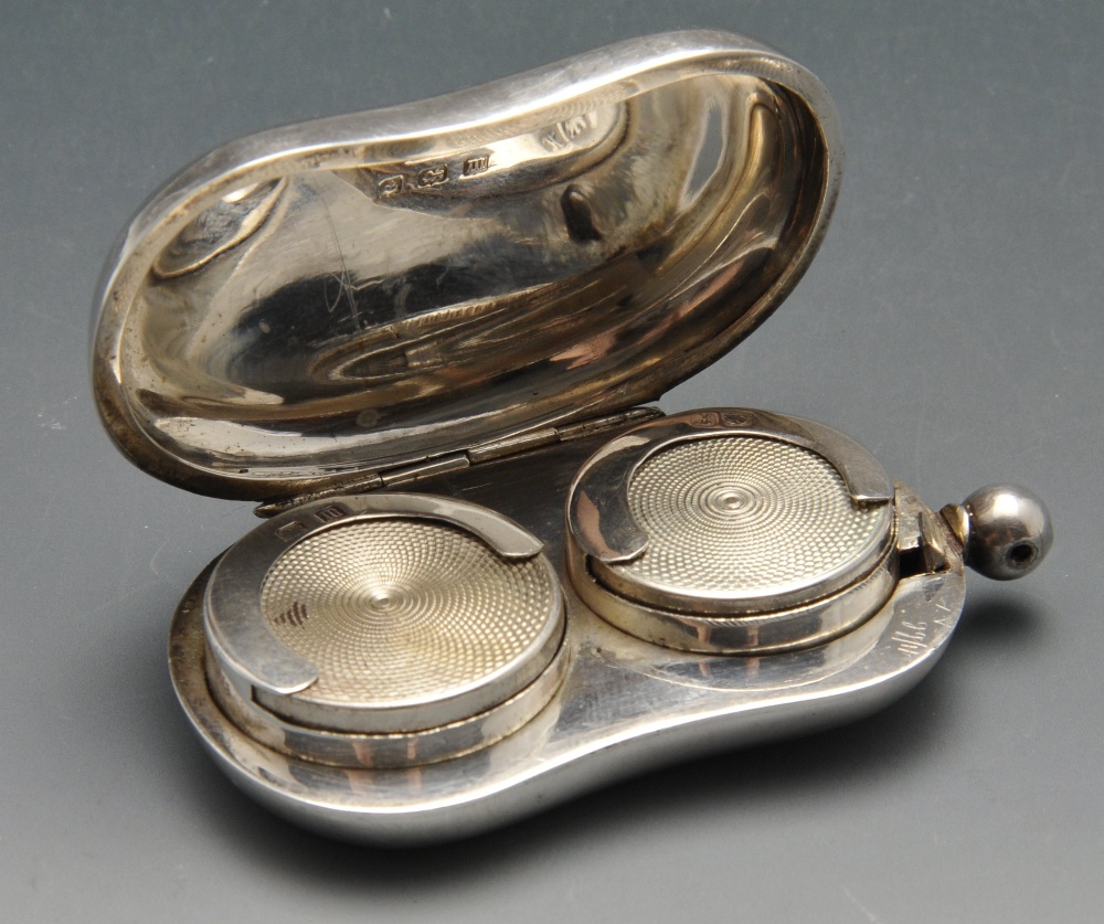 An early twentieth century double sovereign case of plain kidney form, the hinged case opening to - Image 2 of 6