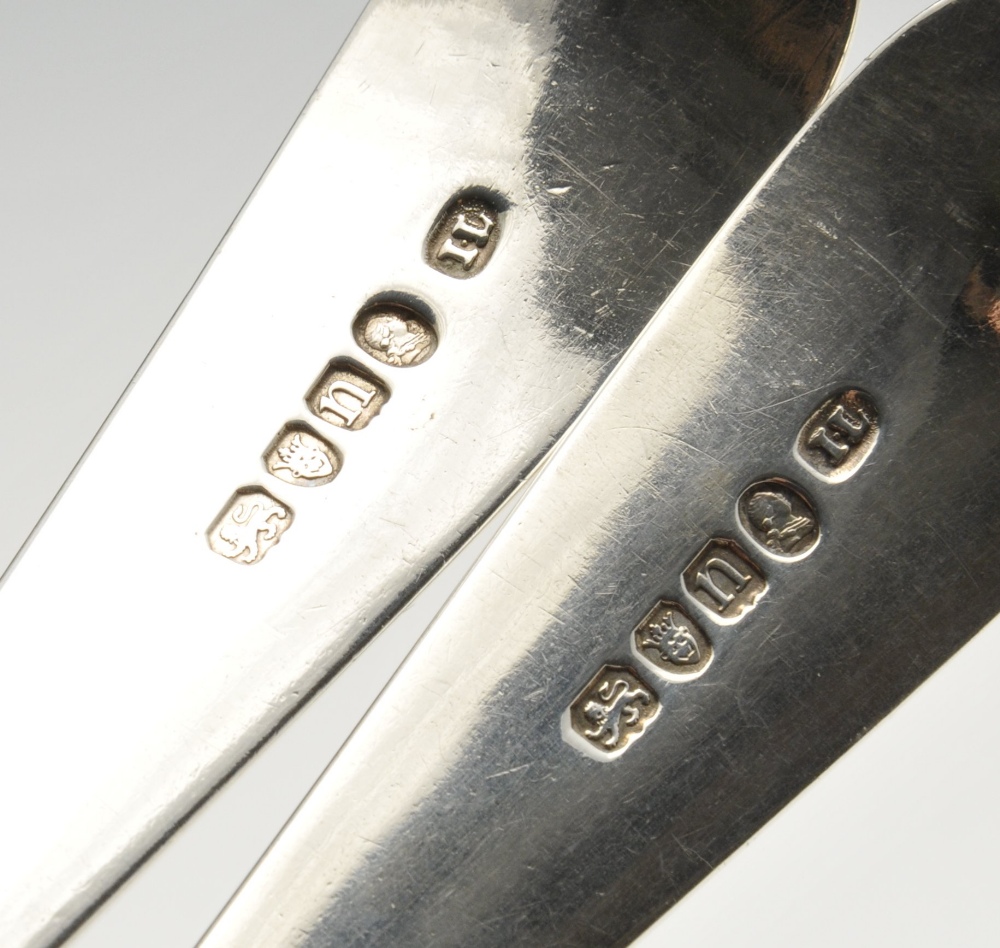 A pair of George III silver basting spoons in Old English pattern, each stem with bright-cut - Image 2 of 6