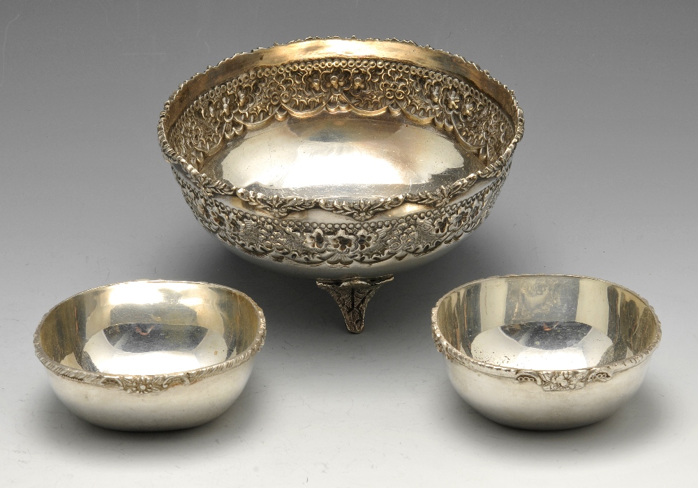 A parcel of continental items to include an embossed circular bowl, marked silver, height