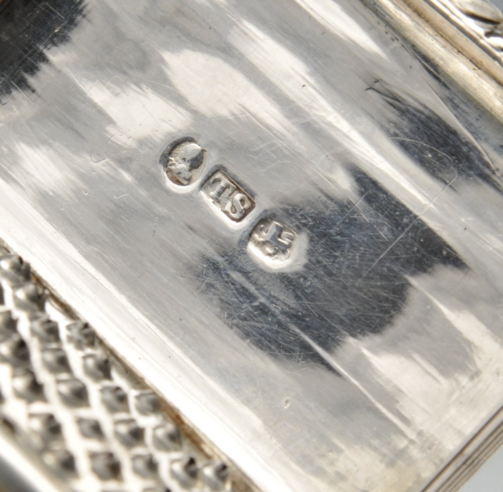 A George IV silver nutmeg grater, the oblong reeded form with dual hinges, crested cartouche and - Image 3 of 5