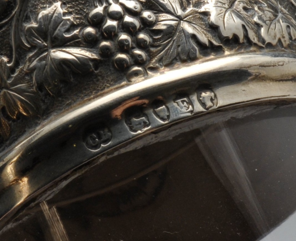 A late Victorian silver mounted claret jug, the Bacchanalian mount having lion and vacant shield - Image 2 of 8