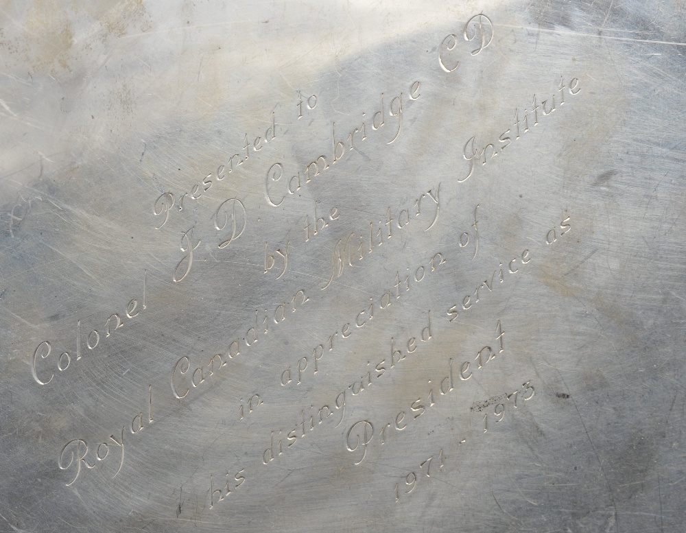 A Canadian sterling silver salver of circular form, having a scrolled rim and presentation engraving - Image 2 of 5